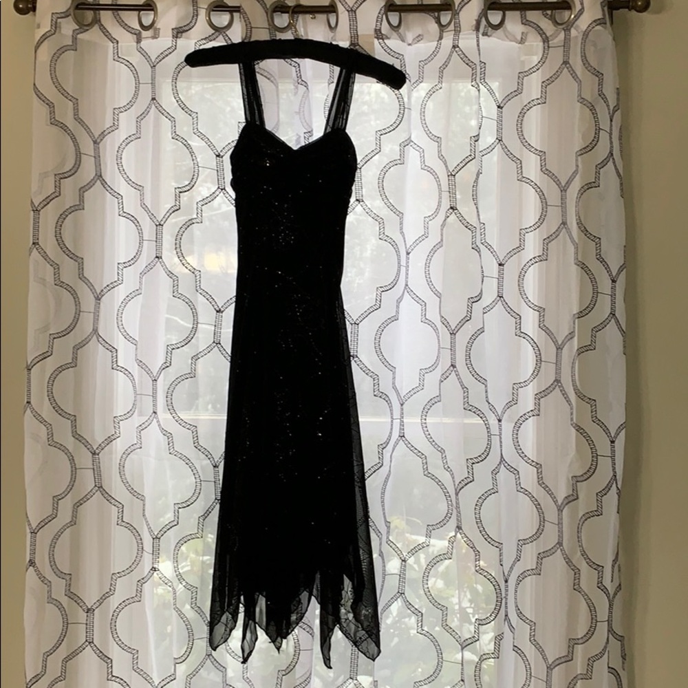 Black cocktail dress asymmetrical hem